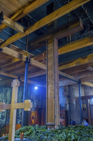 Interior with wooden cross, wooden beams and plants under artificial light, Javari Monastery, Dzhvari Church, Cross Monastery, UNESCO World Heritage Site, Mtskheta, Mtskheta, Mtskheta, Mtskheta-Mtianeti Region, Georgia