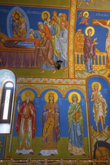 Detailed Orthodox frescoes depicting saints and religious scenes in vivid colors, St. Barbara Cathedral, Batumi, Black Sea, Ajara region, Adjara, Autonomous Republic, Georgia