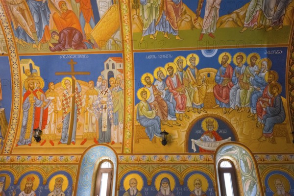 Frescoes in an Orthodox church depict saints and religious scenes in bright colors, St. Barbara Cathedral, Batumi, Black Sea, Ajara region, Adjara, Autonomous Republic, Georgia