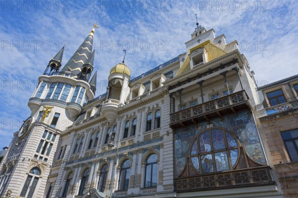 Magnificent building with decorated tower and detailed façade under blue sky, Astronomical Clock, Black Gold Roof, Europe Square, Batumi, Black Sea, Ajara Region, Adjara, Autonomous Republic, Georgia