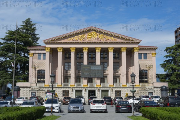 An imposing building with ancient columns and golden decoration, cars parked in front of it, Ilia Chavchavadze Drama Theatre and Opera House, Batumi, Black Sea, Ajara region, Adjara, autonomous republic, Georgia