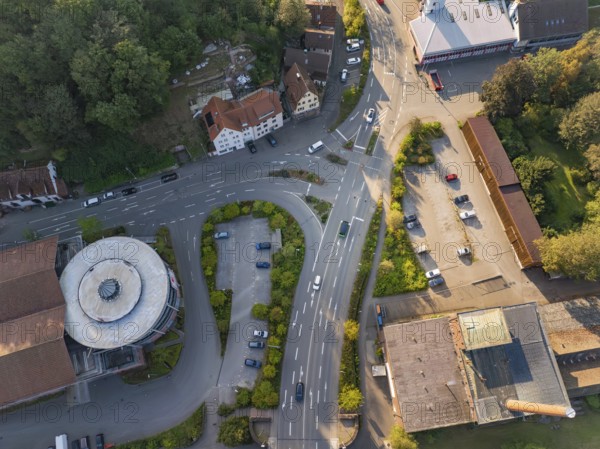 Aerial view of an urban intersection with surrounding buildings and trees, Deer E-Mobility Shuttle Service, Calw, Germany
