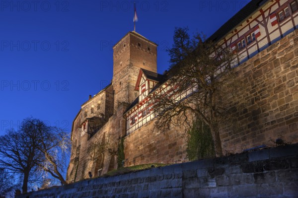 The Nuremberg Kaiserburg in evening lighting, blue evening sky, Mount of Olives, Nuremberg, Mittelfranlen, Bavaria, Germany
