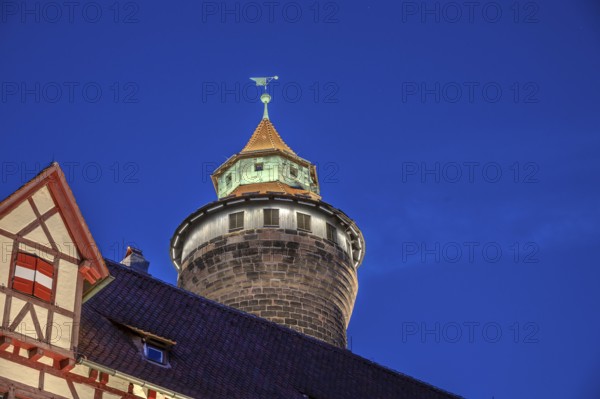 Sinwell Tower built in the 13th century, on the Nuremberg Kaiserburg in the evening lighting, blue evening sky, Mount of Olives, Nuremberg, Middle Franconia, Bavaria, Germany