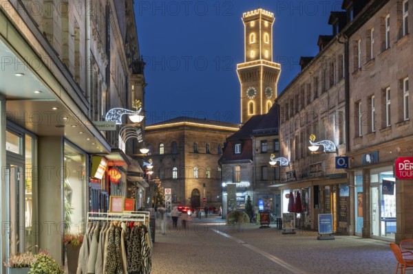 Pedestrian zone in evening lighting, the illuminated town hall tower at the back, blue evening sky, Fürth, Middle Franconia, Bavaria, Germany