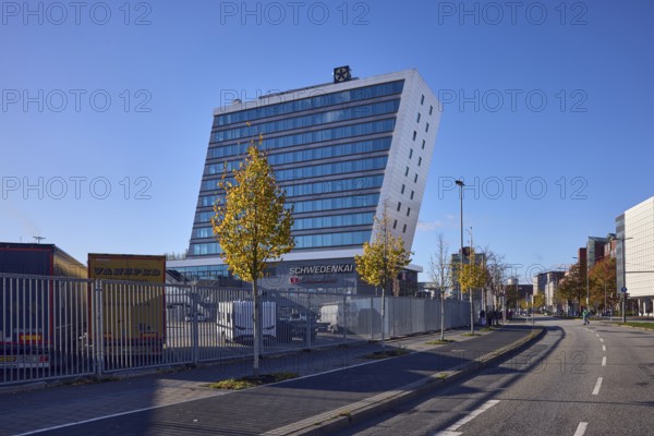 Schwedenkai ferry terminal, general development, commercial building, modern architecture, lanes, lantern, metal fence, trees, autumn leaves, blue sky, cloudless, Kaistraße street, Kiel, state capital, district-free city, Schleswig-Holstein, Germany
