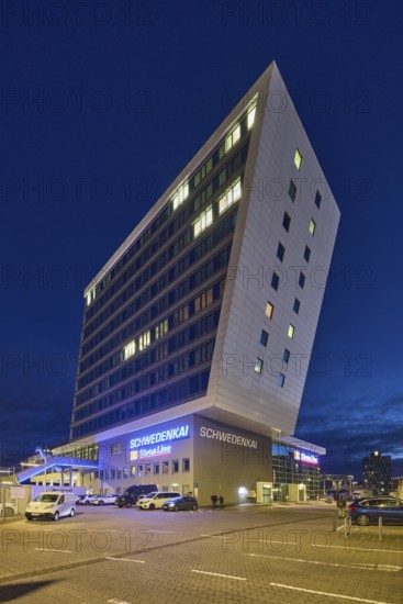 Schwedenkai ferry terminal, Stena Line GmbH, commercial building, modern architecture, street, vehicles, evening blue hour, deep blue evening sky, cumulus clouds, Kaistraße, Kiel, state capital, district-free city, Schleswig-Holstein, Germany