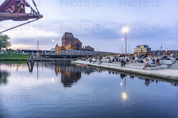 The water staircase at Museumshafen and the Trave at dusk, Lübeck, Schleswig-Holstein, Germany
