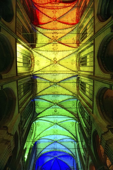 For the Lights On event at CSD Christopher Street Day 2025, the church ceiling of St. Marien will be illuminated with rainbow colors, St. Mary's Church in Lübeck, Schleswig-Holstein, Germany