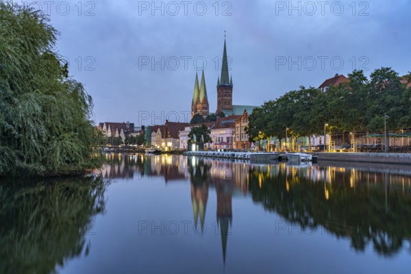Old town with St. Mary's Church and St. Peter's Church and the Trave at dusk, Lübeck, Schleswig-Holstein, Germany