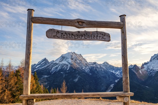 Snow-covered Watzmann through a wooden frame with the inscription Lieblingsplatzerl, Hirscheck, Ramsau, Berchtesgadener Land, Upper Bavaria, Germany