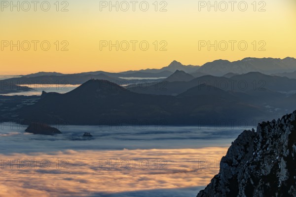 Sunrise in the mountains, view of Salzburg with fog, silhouette of mountain ranges in the back, Zwiesel, Bad Reichenhall, Berchtesgadener Land, Upper Bavaria, Bavaria, Germany