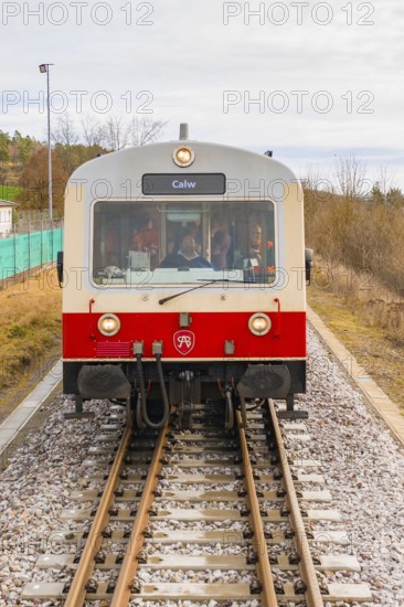 Close-up of a train on the tracks with gray and red front, historic event, first test run with a passenger train on the Hermann tracks, Hesse Railway since 1988, Calw district, Germany