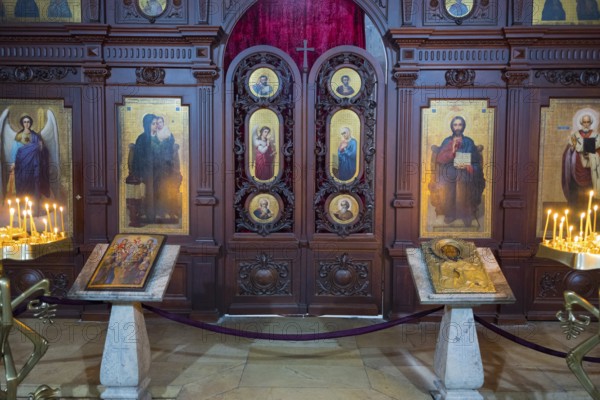 A church interior with ornate icons, altars and burning candles, Svetitskhoveli Cathedral, Svetitskhoveli, UNESCO World Heritage Site, Mtskheta, Mtskheta, Mtskheta, Mtskheta-Mtianeti Region, Georgia