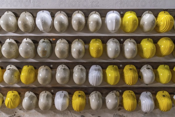 Miners' helmets at the entrance to the tunnel in the coal world, Steinkohlebergbau Sachsen Museum, Oelsnitz im Erzgebirge, Saxony, Germany