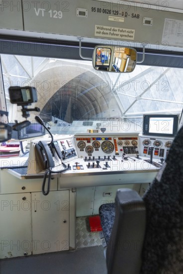 View of a tunnel from the train driver's cab, with technical equipment and control panel in the foreground, historic event, first test run with a passenger train on the Hermann tracks, Hesse Railway since 1988, Calw district, Germany