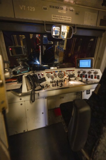Driver's cab in the dark with illuminated control panel and technical controls, historic event, first test drive with a passenger train on the Hermann tracks, Hesse Railway since 1988, Calw district, Germany