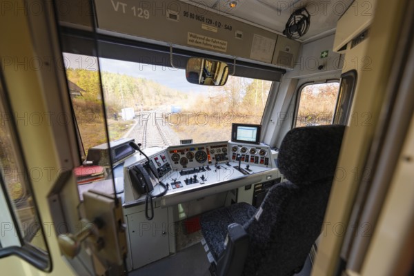 Driver's cab of a train with a view of the rails, technical instruments and control elements available, historic event, first test run with a passenger train on the Hermann tracks, Hesse Railway since 1988, Calw district, Germany