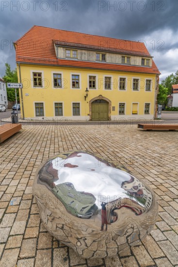 Sculpture, art installation Trashstone 689 in the form of a silver nugget by artist Wilhelm Mundt, Purple Path art and sculpture trail of the European cultural region around the cultural capital Chemnitz, Freiberg, Saxony, Germany