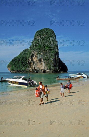 Rocks in the sea, boats and people on Pranang Cave beach, two years in front of the tsunami, Krabi, Thailand, December 2002, vintage, retro, old, historic