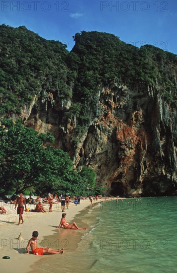 People bathing and sunbathing on Pranang Cave beach, two years in front of the tsunami, Krabi, Thailand, December 2002, vintage, retro, old, historic
