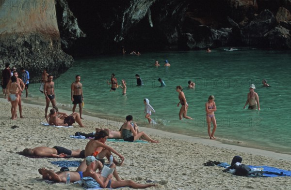 People bathing and sunbathing on Pranang Cave beach, two years in front of the tsunami, Krabi, Thailand, December 2002, vintage, retro, old, historic