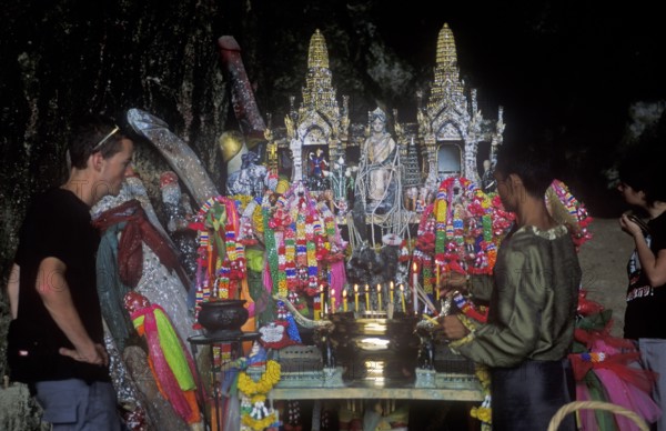Shrine with wooden phalls on Pranang Cave beach, two years in front of the tsunami, Krabi, Thailand, December 2002, vintage, retro, old, historic