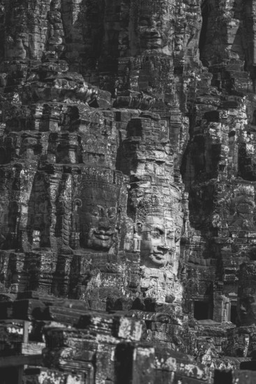 Huge stone-carved faces of Bodhisattva Lokeshvara, also Avalokiteshvara, Bayon Temple, Angkor Thom, UNESCO World Heritage Site, Angkor Wat, Siem Reap, Cambodia