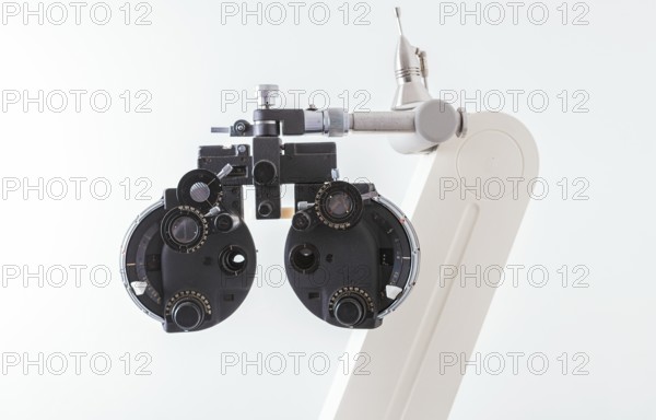 Close up of Phoropter of ophthalmology. optometry and optician clinical testing machine equipment. Phoropter on isolated background