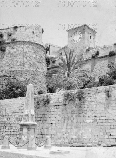 Lascaris clock tower and fortress defensive walls of the Citadel, Victoria, Island of Gozo, Malta, Europe 1956
