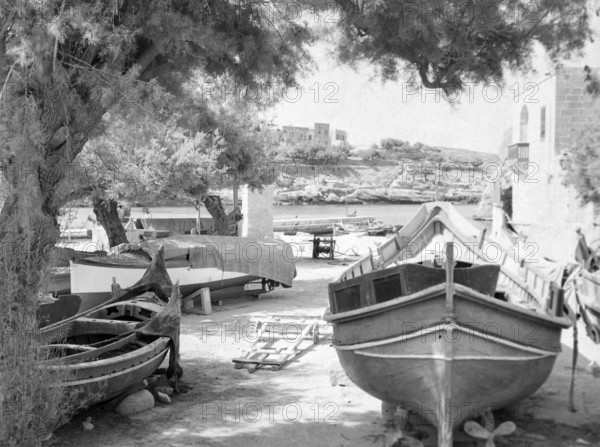 Fishing boats at village of Xlendi Beach, Island of Gozo, Malta, Europe, 1956