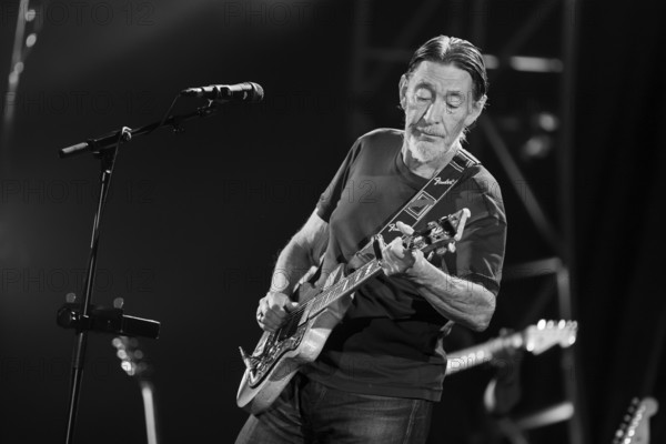 Chris Rea, singer and guitarist Christopher Anton Chris Rea live on Road Songs for Lovers tour at Berlin's Tempodrom on 30.10.2017. Note: the photo was later converted to b/w