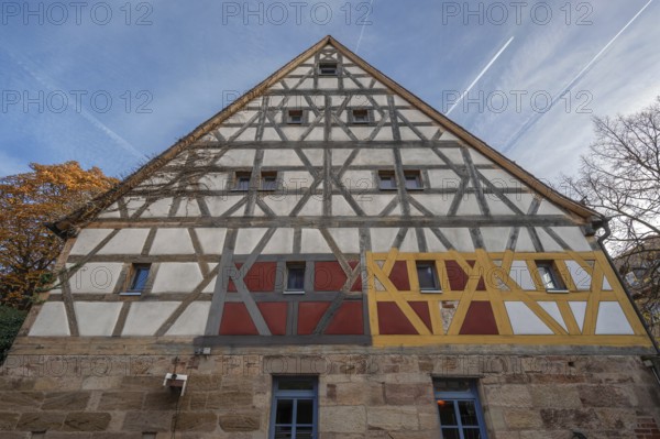 Color test on the façade in front of the renovation of a historic half-timbered house, Fürth, Middle Franconia, Bavaria, Germany