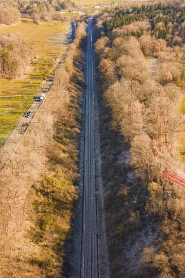 A railway line stretches through a dense forest landscape in winter, construction of the Hermann Hesse Railway, Calw, Germany