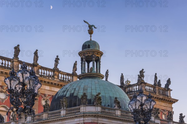Figures and statues at the new palace in Sanssouci Park in the evening light, Potsdam