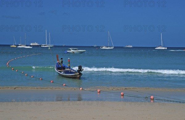 Longtail boat and yachts on Patong Beach, Ko Phuket, two years in front of the tsunami, Thailand, December 2002, vintage, retro, old, historic