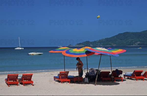 Paragliders, umbrellas, boats, people, Patong Beach, Ko Phuket, two years in front of the tsunami, Thailand, December 2002, vintage, retro, old, historic