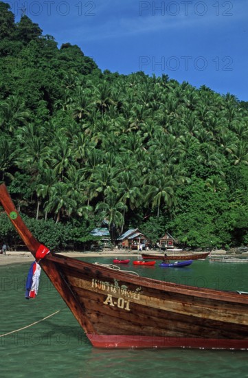 Bamboo huts, longtail boat on Ko Phi Phi Don beach, two years in front of the tsunami, Thailand, December 2002, vintage, retro, old, historic