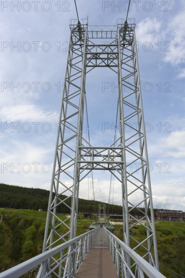 Close-up of the steel structure of a modern suspension bridge against a blue sky, Diamond Glass Bridge, world's longest free-hanging structure, Dashbashi Gorge, Khrami River, Chrami, Tsalka Nature Reserve, Kartli, Georgia