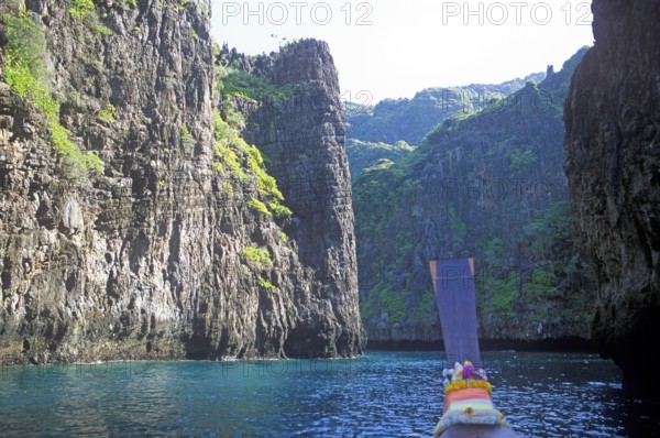 Boat trip through rocky bay, Ko Phi Phi Don, Thailand, December 2002, vintage, retro, old, historic