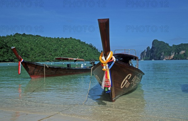 Longtail boats on Ko Phi Phi Don beach, two years in front of the tsunami, Thailand, December 2002, vintage, retro, old, historic