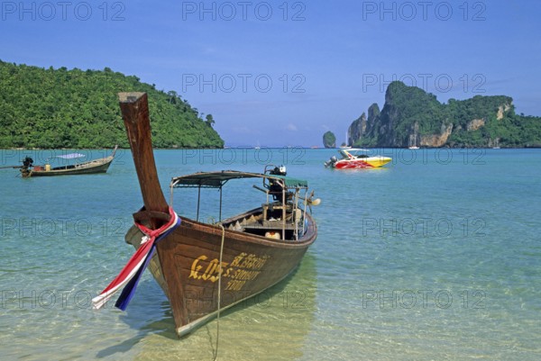 Longtail boat on Ko Phi Phi Don beach, two years in front of the tsunami, Thailand, December 2002, vintage, retro, old, historic