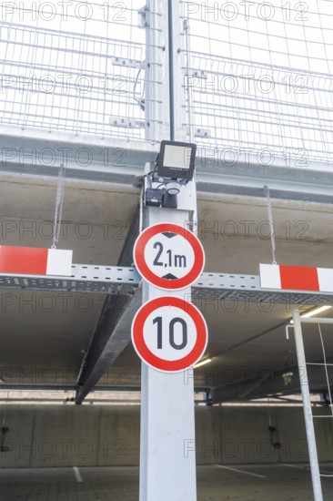 Traffic signs for height and speed restrictions in parking garages, parking garage construction with charging infrastructure, Calw, Germany