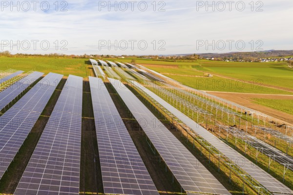 Wide solar fields spanning the hilly landscape, energy revolution, construction of PV open space, Baden-Württemberg, Germany