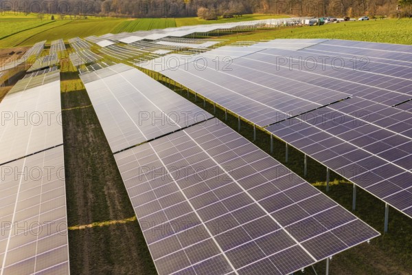 Elongated solar fields on lush fields, energy revolution, construction of PV open space, Baden-Württemberg, Germany
