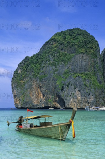 Longtail boat on Maya Bay beach, known from the movie The Beach, one year in front of the tsunami, Ko Phi Phi Le, Thailand, December 2002, vintage, retro, old, historic
