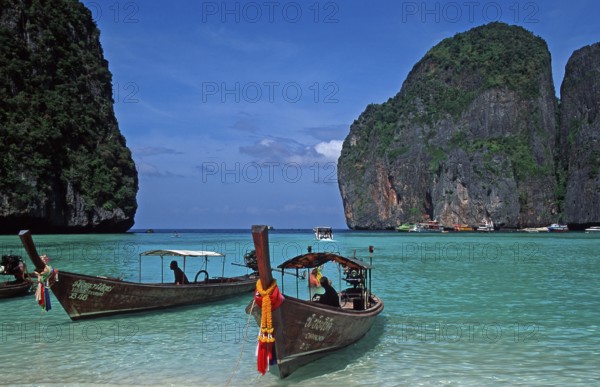 Longtail boats on Maya Bay beach, known from the movie The Beach, one year in front of the tsunami, Ko Phi Phi Le, Thailand, December 2002, vintage, retro, old, historic