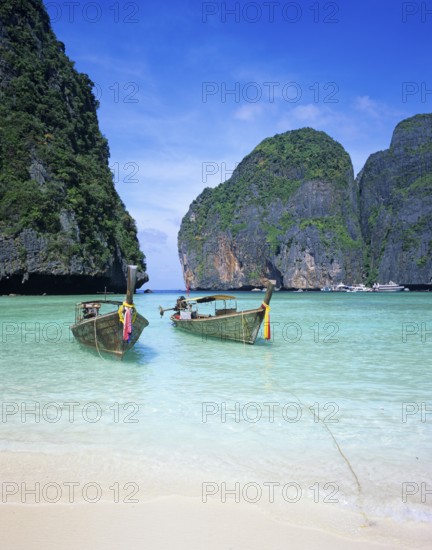 Longtail boats on Maya Bay beach, known from the movie The Beach, one year in front of the tsunami, Ko Phi Phi Le, Thailand, December 2002, vintage, retro, old, historic
