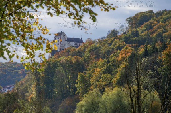 Egloffstein Castle with mixed autumn forest, Egloffstein, Upper Franconia, Bavaria, Germany