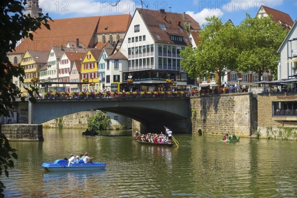 Eberhardsbrücke, Neckar bridge, river, flowing water, old town on the left back, houses, poking barge, pedal boat, Tübingen, Baden-Württemberg, Germany